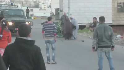 Peaceful Israeli solider gets pushed to the ground by armed HAMAS wheelchair terrorist.