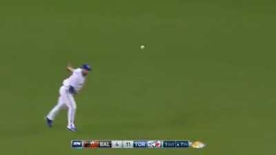 Kevin Pillar makes an insane diving catch, quickly gets up and throws out a runner returning to second base
