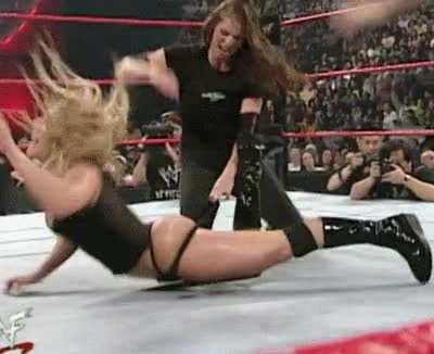 Trish Stratus gets sp*nk** by Stephanie McMahon