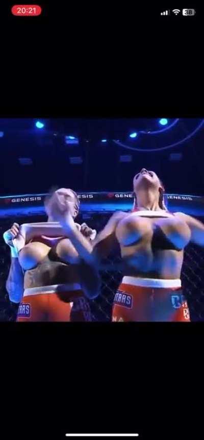 Female fighters Inked Dory and Karina Pedro flash their boobs at the crowd during MMA event in Prague