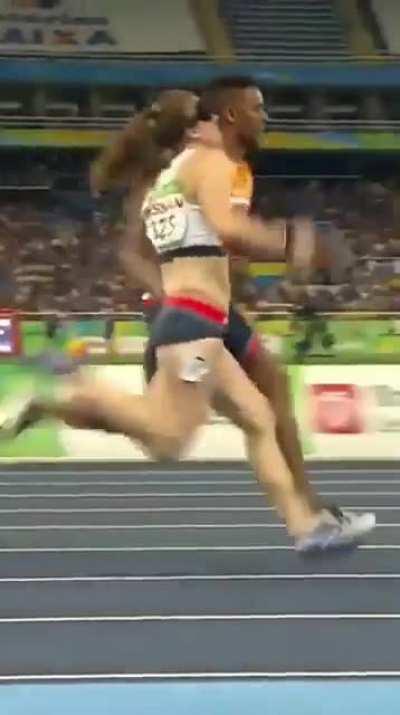 Amazing Paralympic blind runner with her hero guide. 