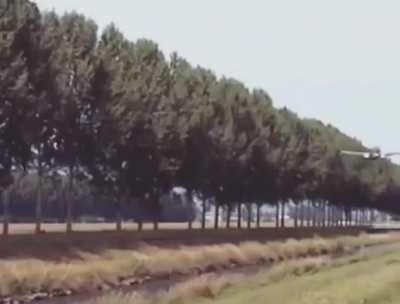 P-40, P-51, F4U and Spitfire low pass through a channel with sound