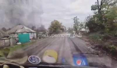 Ukrainian soldiers advancing under Russian artillery attack. date & location unknown