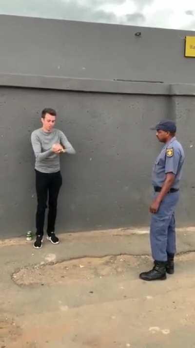 Guy shows tricks to the policeman