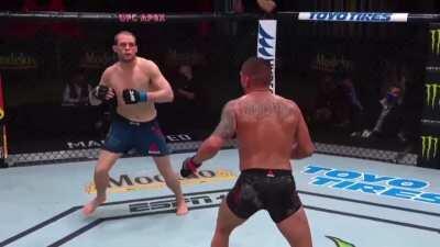 Anthony Pettis landing a beautiful wheel kick in his final UFC fight.