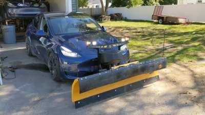 Just rolled out of the shop. Customer had us do a custom plow install on their Tesla