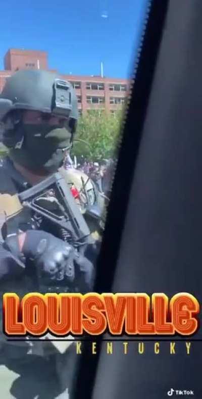 Armed militia in the streets of Louisville