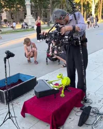 Puppeteer making puppet play a mini piano