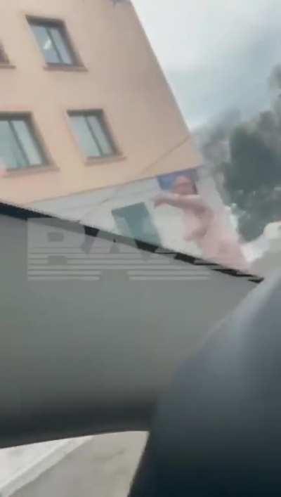 Naked woman chases police officer