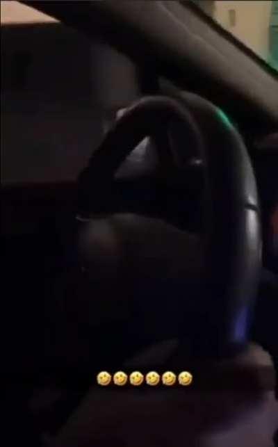 Man in France grabs onto pedestrians arm and drags them along side his car until they fall.