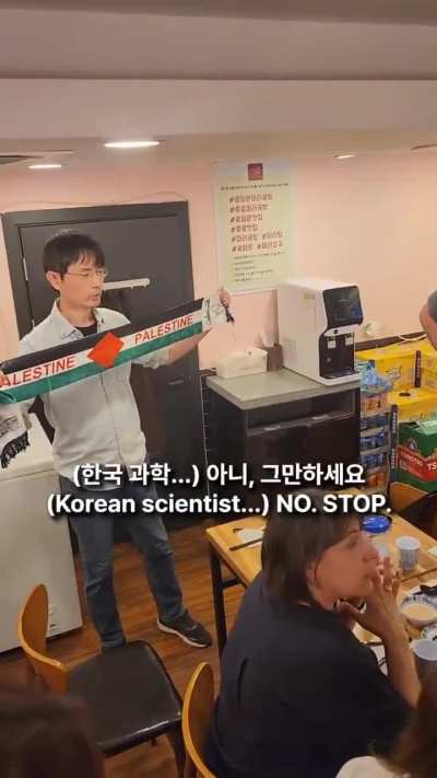 Protestors confront Israeli ambassador to South Korea in a restaurant