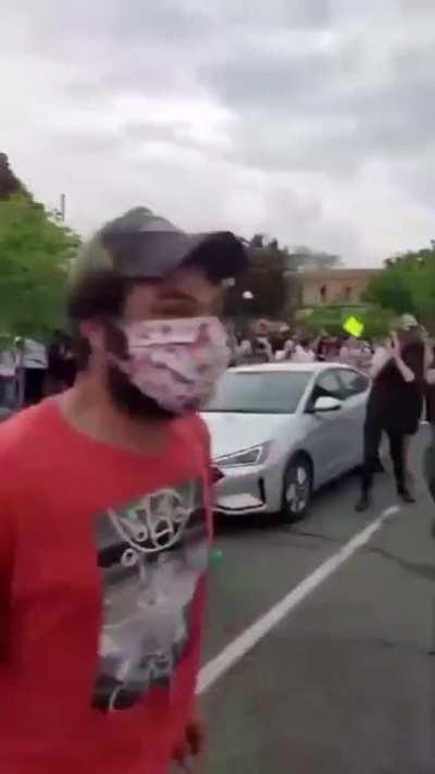 Protesters smash cop car windows in the wake of the George Floyd murder