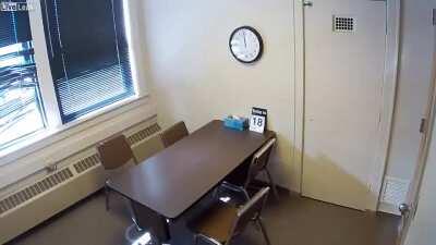 To have an unlocked window in an interrogation room