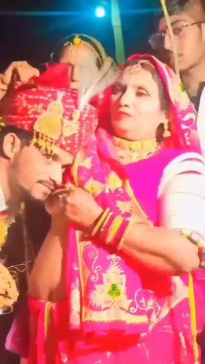 An Indian groom of a certain community performing the ritual of sucking your momma tits for the last time before leaving with wife