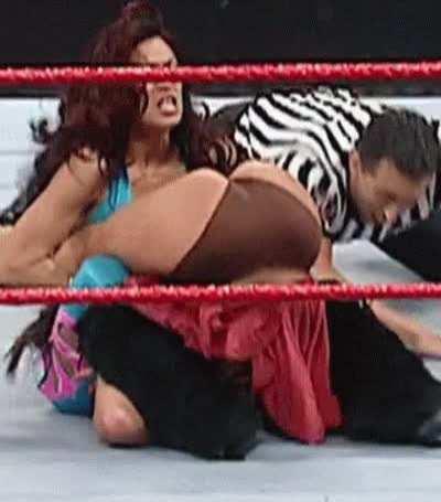 Melina showing off Mickie's fat ass