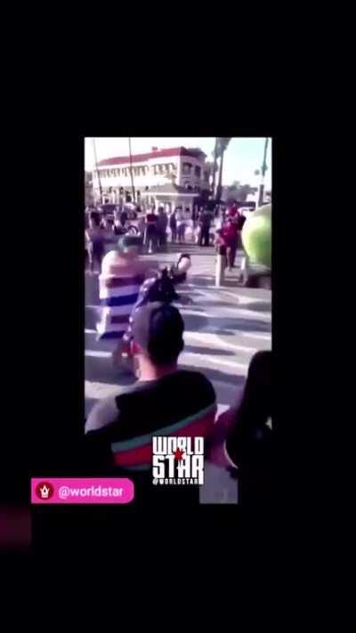 Racist lady gets beat after N word