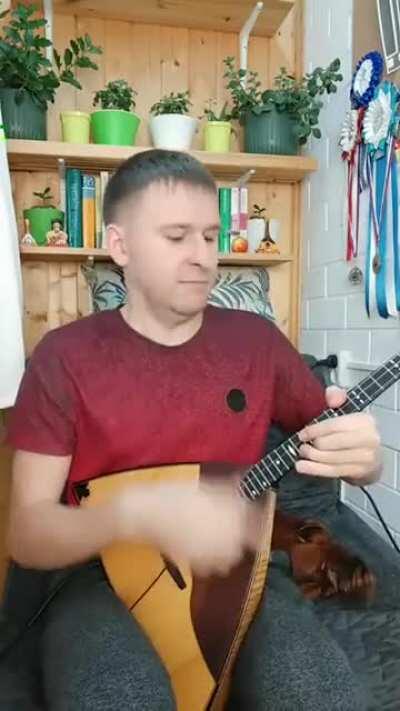 Robert B. Weide on a balalaika.