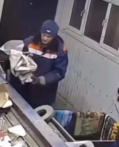 This guy saving kitten from trash cutting machine.