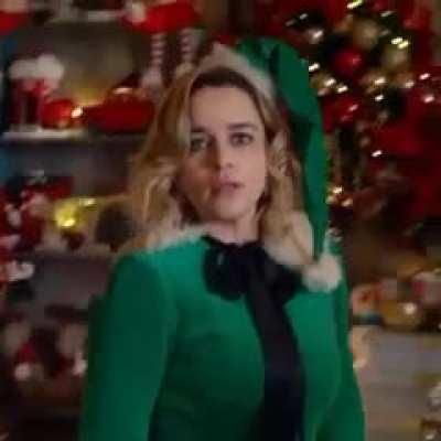 Emilia Clarke realizing that Santa came for more than just her milk and cookies