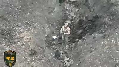 A longer video of the Russian surrendering to a Ukrainian drone