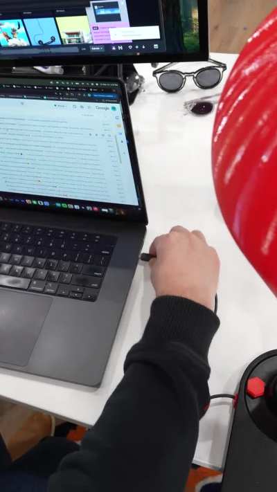 I build unnecessary things and today I made a punching bag that writes a passive aggressive email for you. 