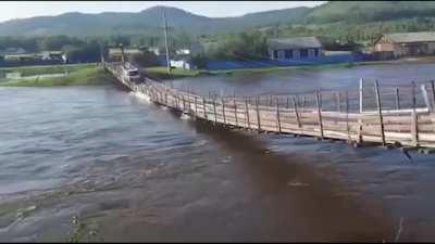 WCGW driving across an unstable wooden bridge