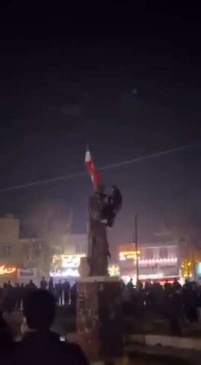 After taking down the Islamic Republic's flag across the country, the protestors raised Iran's national flag