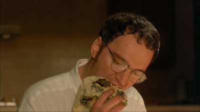 In From Dusk till Dawn (1996), Tarantino is eating a burger when the camera is facing him and is drinking beer when the camera angle changes.