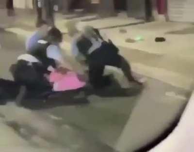 The cop literally put that man's hand on the stick just so he could have a reason to beat him up