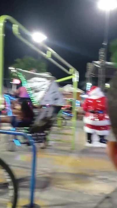 Riding rickshaw bicycles around a kid's park/open gym area. 
