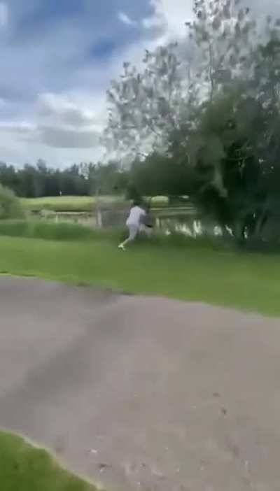 Drunk golfer finds a water hazard and gets his lunch fed to him