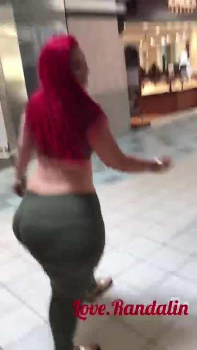 Randa walks spandex in mall