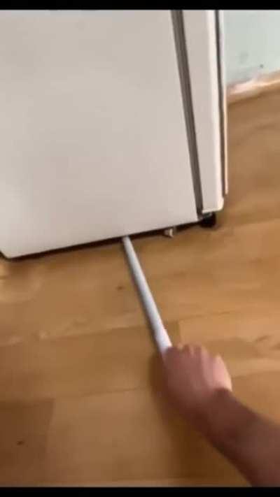 Amazing way to clean under the fridge 👏👏