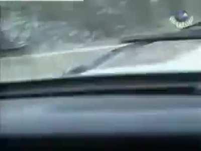 [Chechnya] Chechen mujahideen ambush a Russian military jeep with a PKM while driving. Second Chechen War. *Early 2000s*