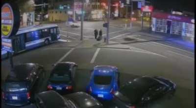 Running a red light into a bus