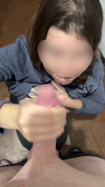 Blowing him while I tease my tits