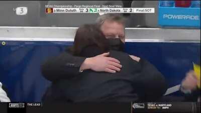 Minnesota-Duluth's Luke Mylymok scores in the 5th overtime to defeat North Dakota in the longest NCAA hockey tournament game ever