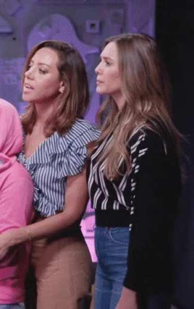 Elizabeth Olsen spanking Aubrey Plaza