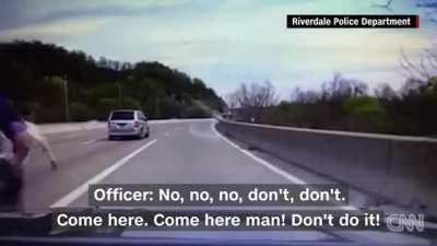 Officer runs to save suicidal man