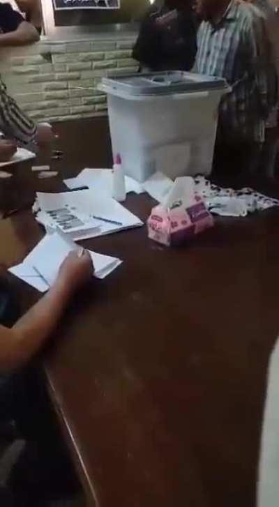 Election officials filled out ballots and handed them back to voters to drop in, leaving no room for “democratic” error. This is Syria's election, manipulated by Assad