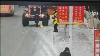 Walking right in front of a tractor