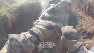 Ukrainian Soldiers assaulting Russian trench positions