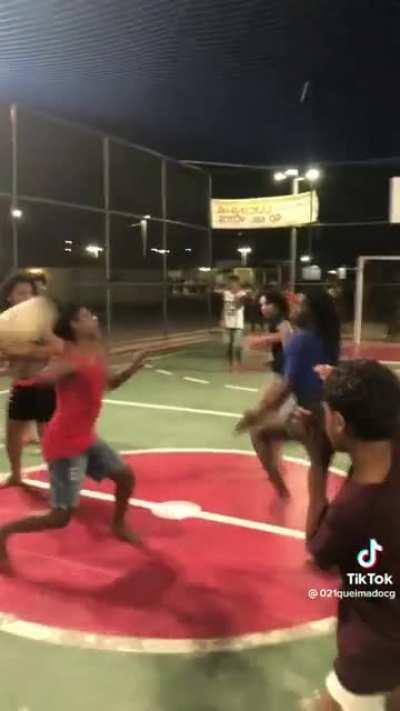 Super intense dodgeball game on a basketball court