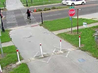 Cyclist tests their luck with careless driver