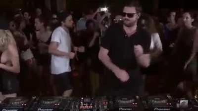 When you feel the beat so much that you sync with the DJ (girl in white at the right)