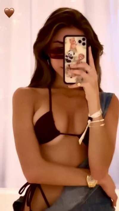 Showing off her insanely sexy tits