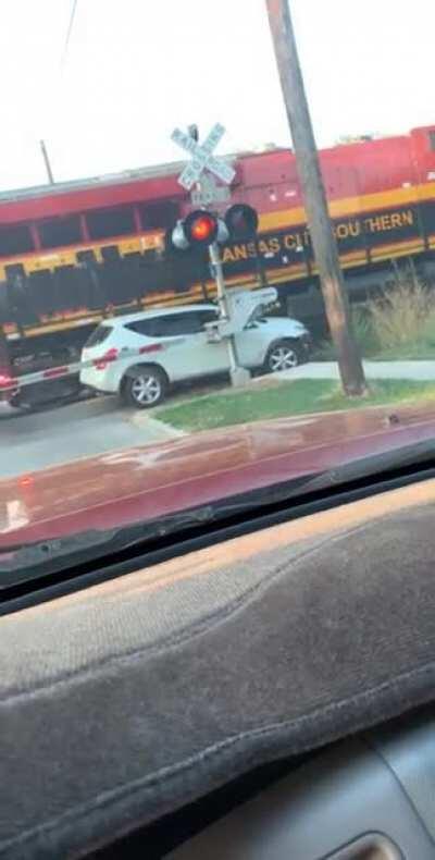 Everyone is ok. Witnessed this morning. Lady decides to stop in the middle of some tracks.