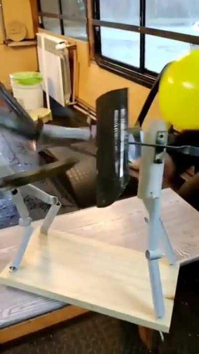 Игрушки инженеров. Двое парней сделали игрушку в которой нужно лопнуть шар соперника. В одной руке щит, в другой нож.