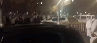 Protestors charge police in Urumqi, China over Covid Lockdown