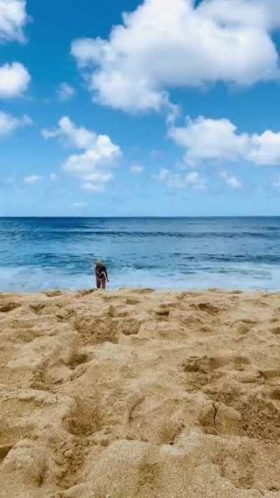 running up and down the beach